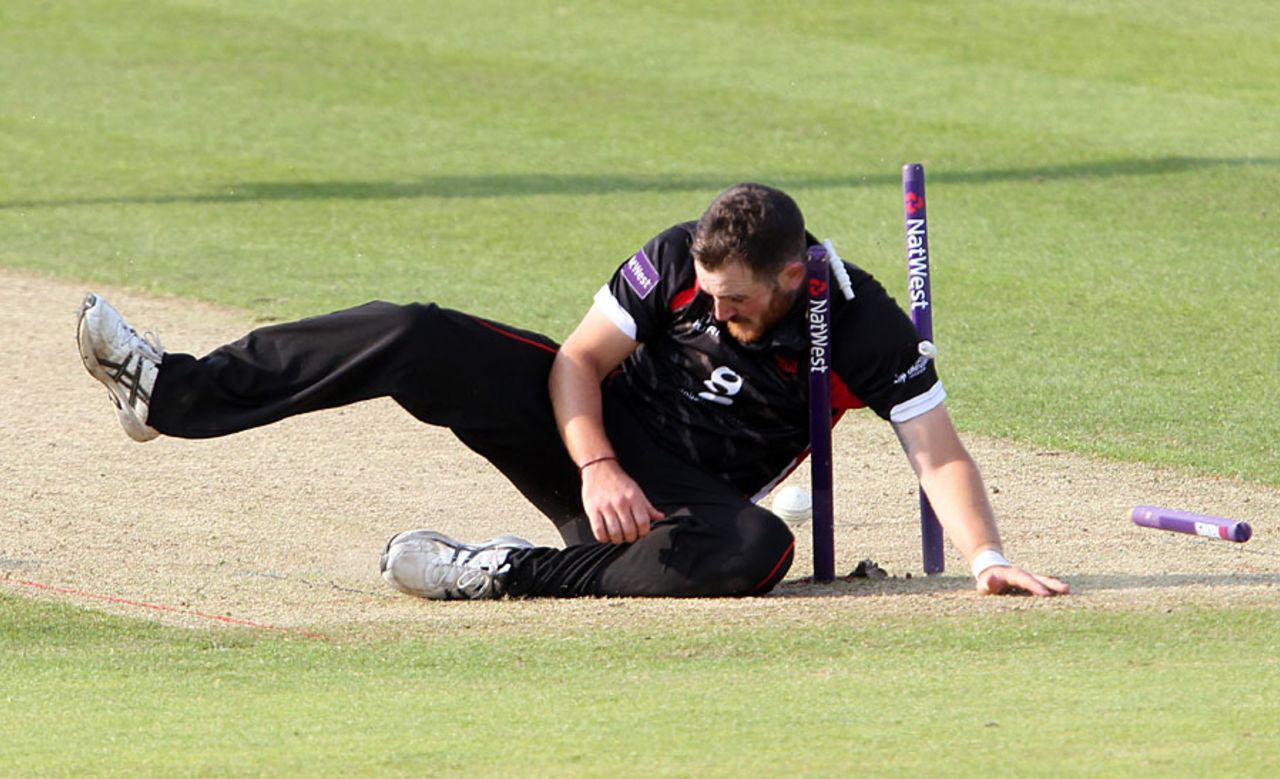 That's a mess: Ben Raine demolishes the stumps while attempting a run out, Durham v Leicestershire, NatWest T20 Blast, Chester-le-Street, June 20, 2014