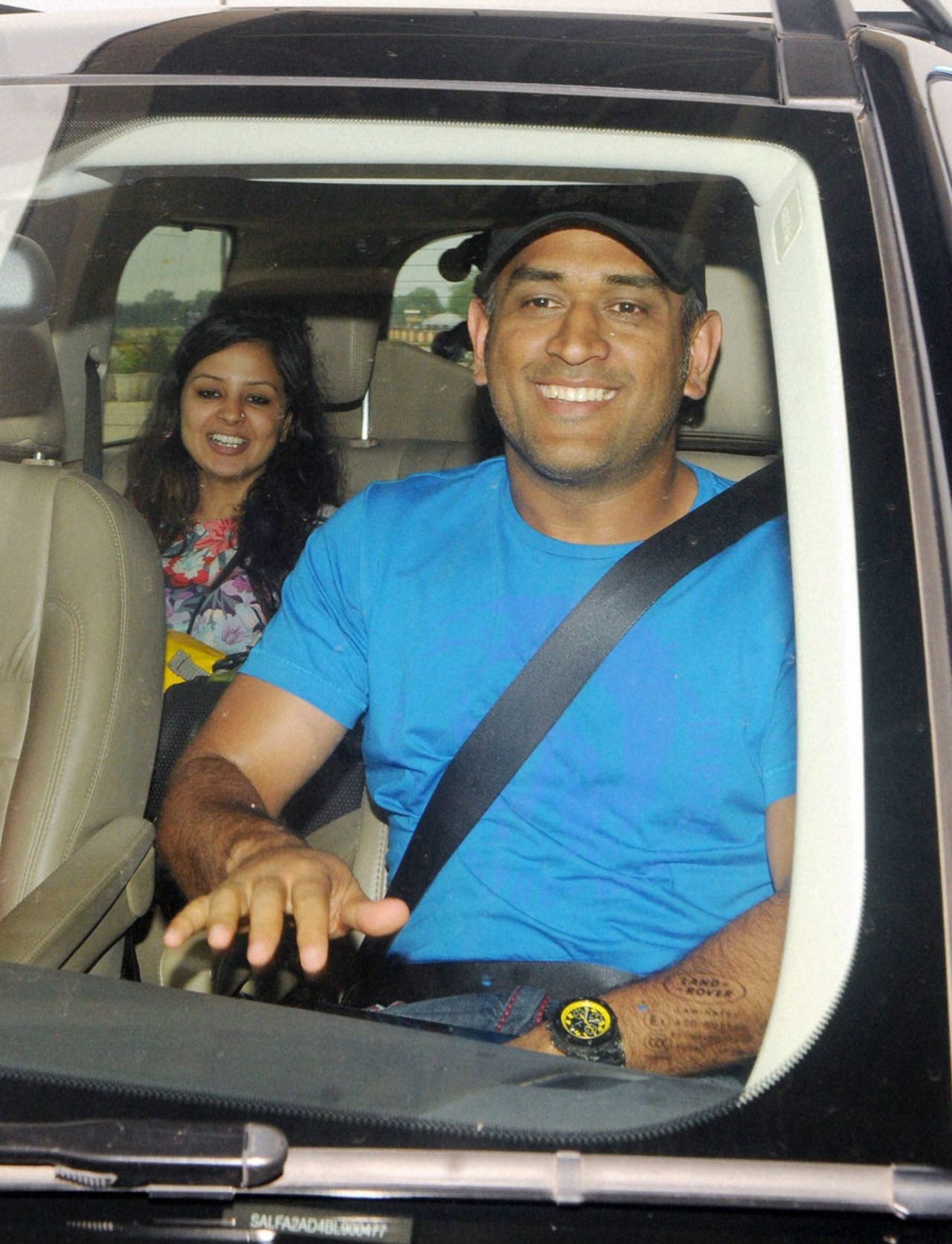 MS Dhoni with his wife Sakshi in Ranchi, Ranchi, June 21, 2014