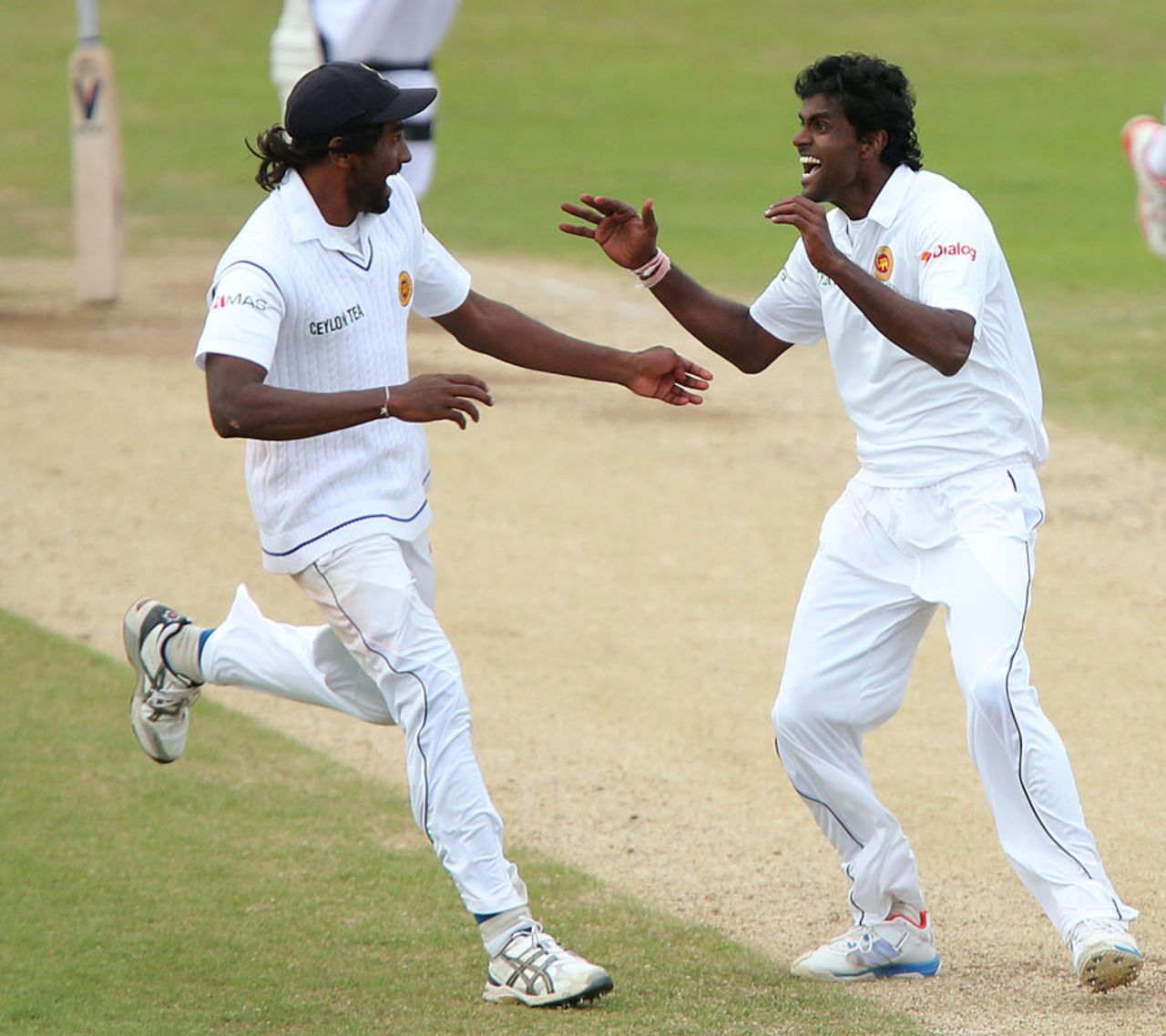 Shaminda Eranga (right) took the series-winning wicket, England v Sri Lanka, 2nd Investec Test, Headingley, 5th day, June 24, 2014