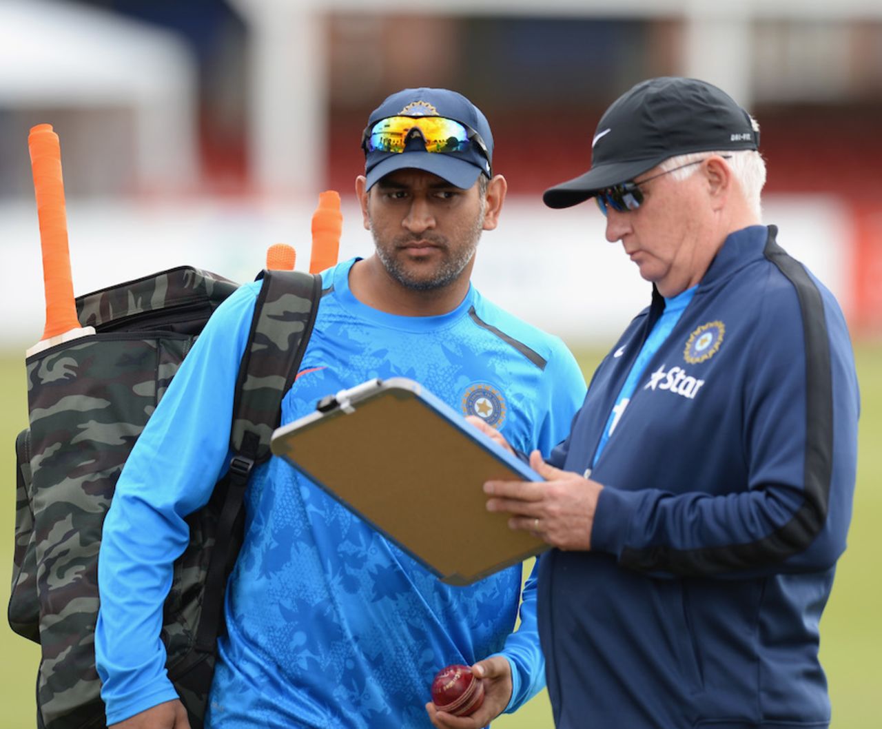 Duncan Fletcher shares notes with MS Dhoni after India's training session, Leicester, June 25, 2014 