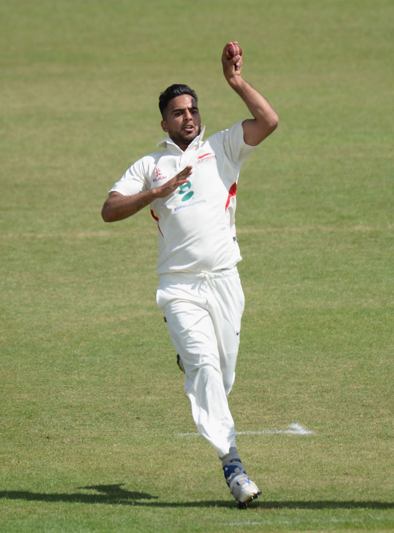 Atif Sheikh has a bowl, Leicestershire v Indians, Leicester, 1st day, June 26, 2014