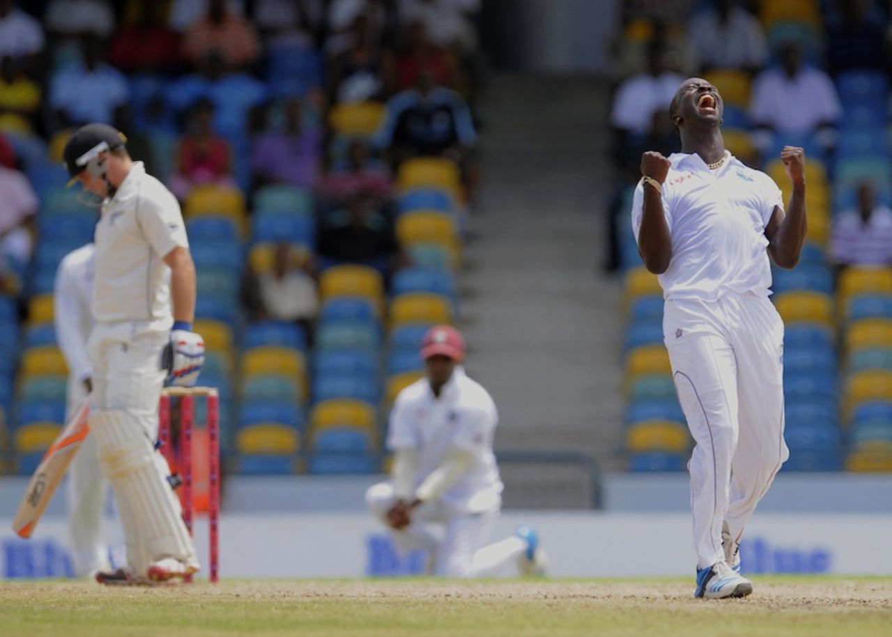Kemar Roach celebrates Tom Latham's dismissal, West Indies v New Zealand, 3rd Test, Barbados, 1st day, June 26, 2014