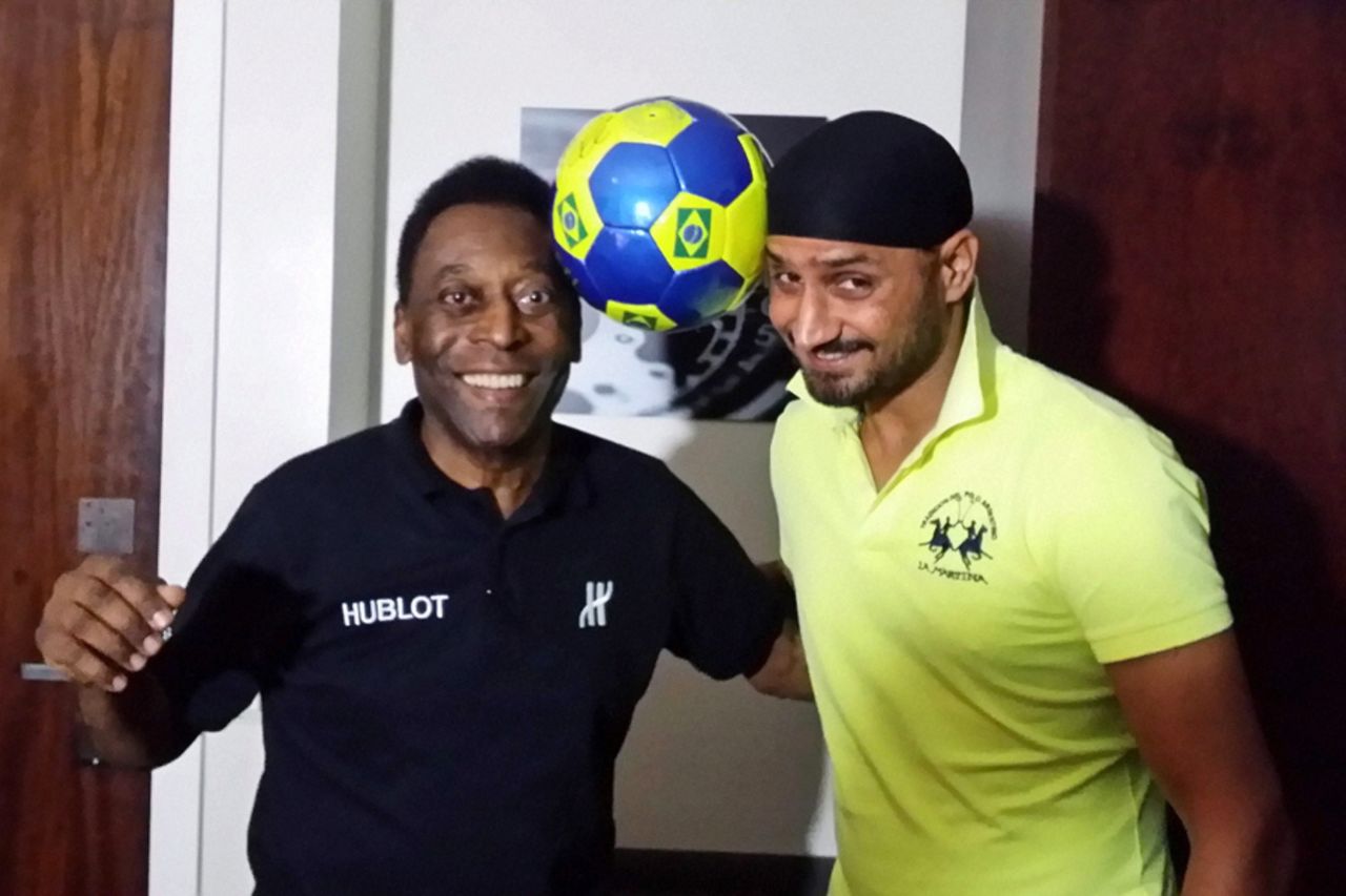 Harbhajan Singh shares a light moment with football great Pele during the FIFA World Cup in Brazil, June 28, 2014