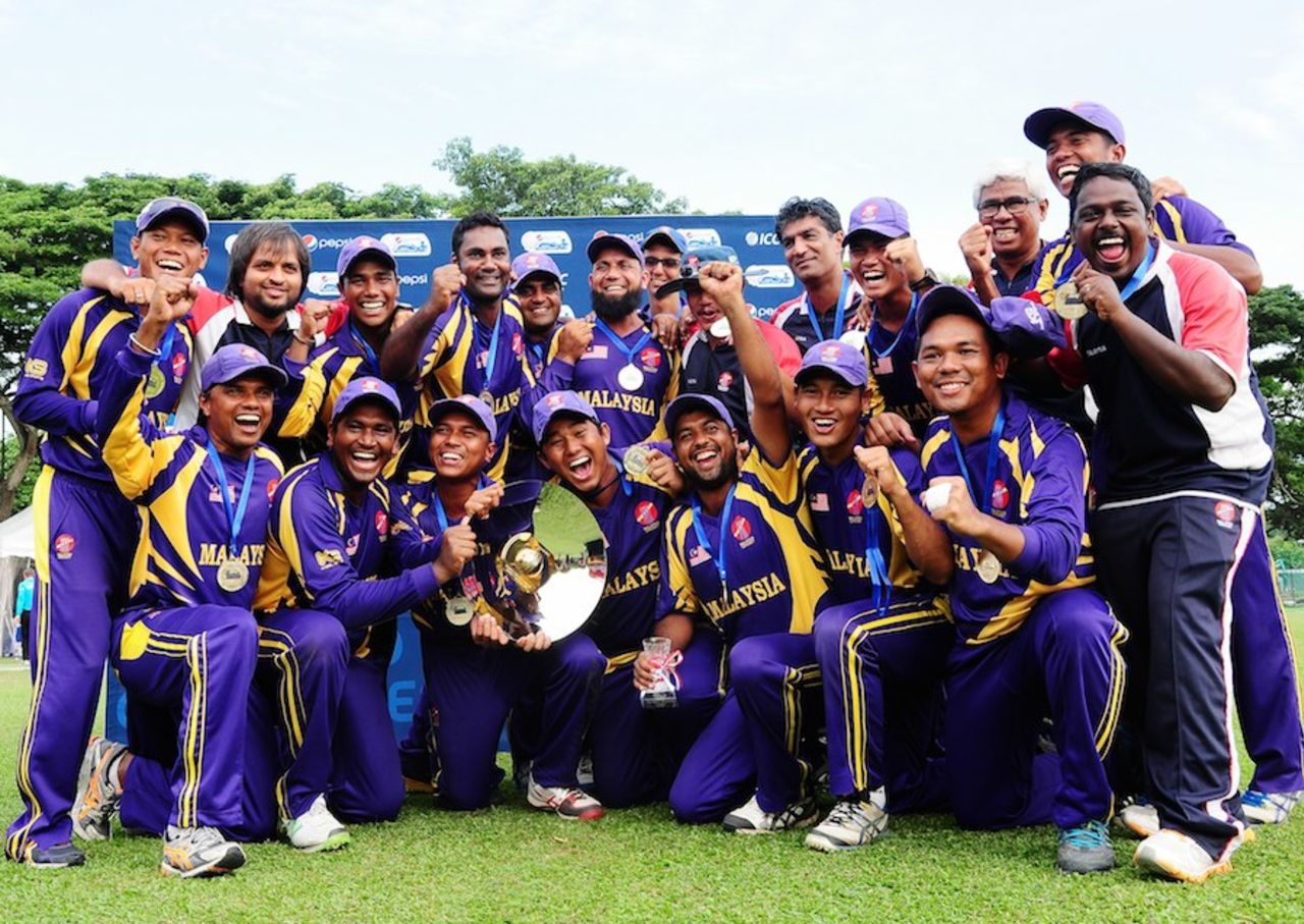 Malaysia celebrate winning World Cricket League Division Four title, WCL division four, Singapore, June 28, 2014