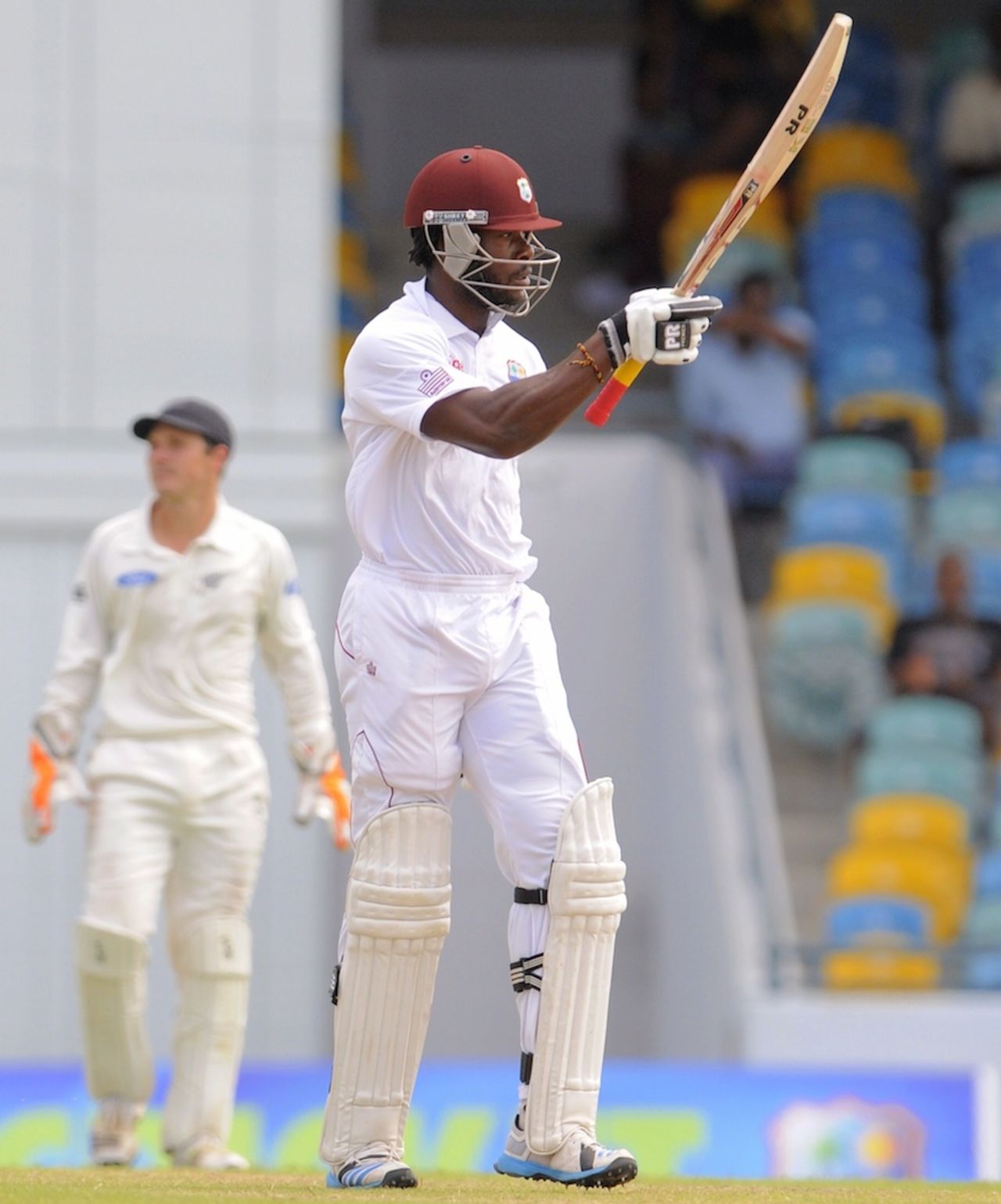 Kirk Edwards raises his bat on reaching his half-century, West Indies v New Zealand, 3rd Test, Barbados, 3rd day, June 28, 2014