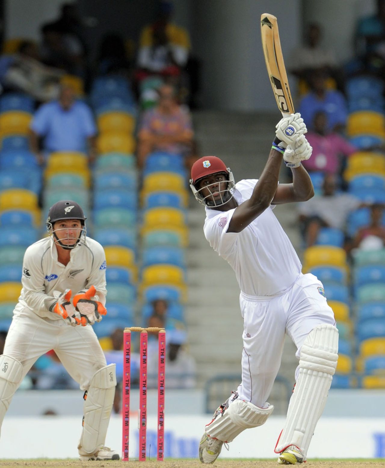Jason Holder plays a lofted shot down the ground, West Indies v New Zealand, 3rd Test, Barbados, 5th day, June 30, 2014
