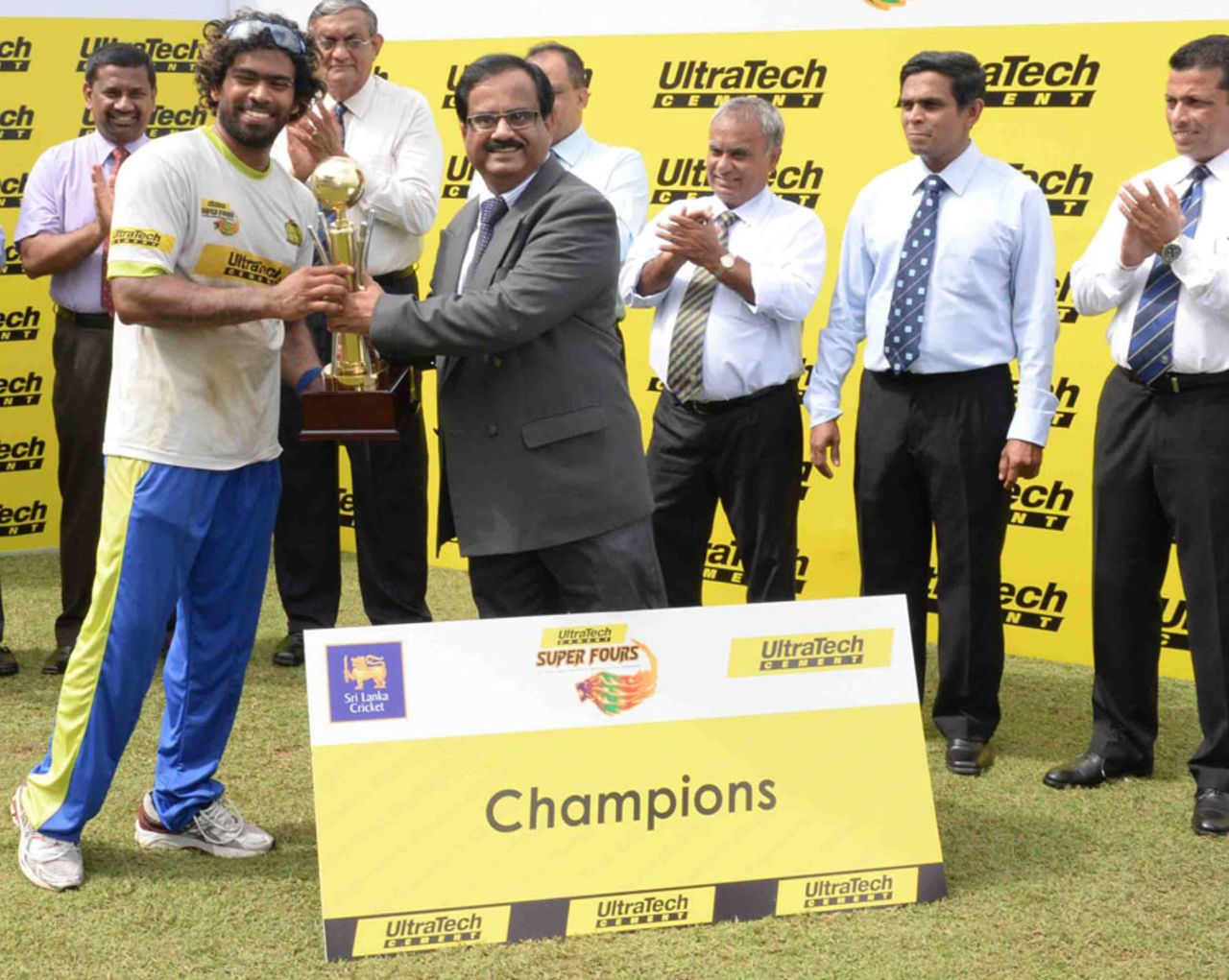 Southern Express captain Lasith Malinga accepts the trophy, Udarata Rulers v Southern Express, SLC Super 4's T20 Tournament, Final, Colombo, July 2, 2014