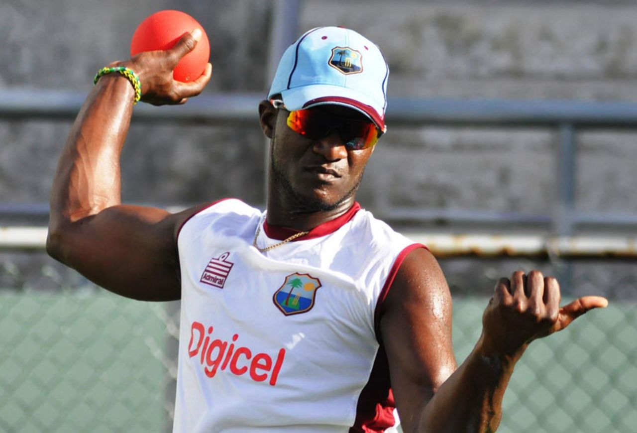 Darren Sammy gets ready to throw a ball, Dominica, July 3, 2014