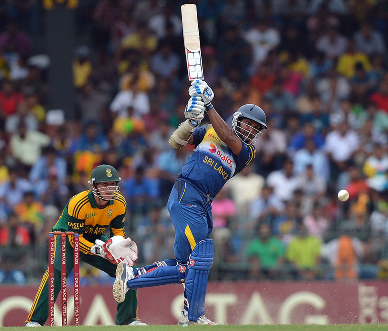 Kumar Sangakkara jumps out of his crease to attack, Sri Lanka v South Africa, 1st ODI, Colombo, July 6, 2014
