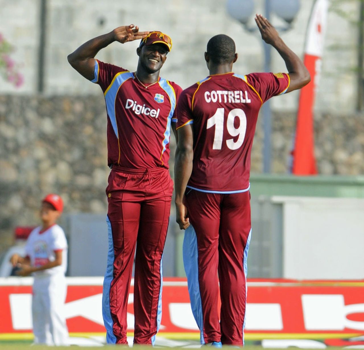 Darren Sammy and Sheldon Cottrell exchange salutes, West Indies v New Zealand, 2nd T20I, Dominica, July 6, 2014