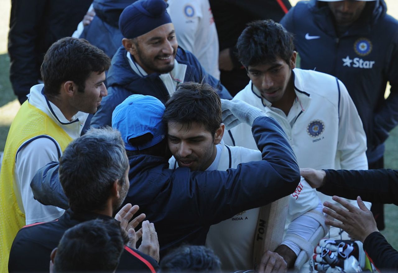 Team-mates congratulate Naman Ojha after India A's declaration, Australia A v India A, 1st unofficial Test, Brisbane, 2nd day, July 7, 2014
