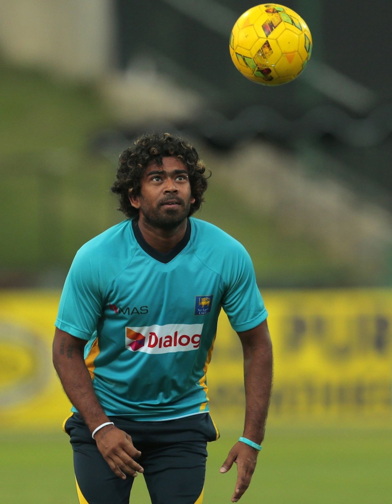 Lasith Malinga prepares to head a football, Pallekele, July 8, 2014