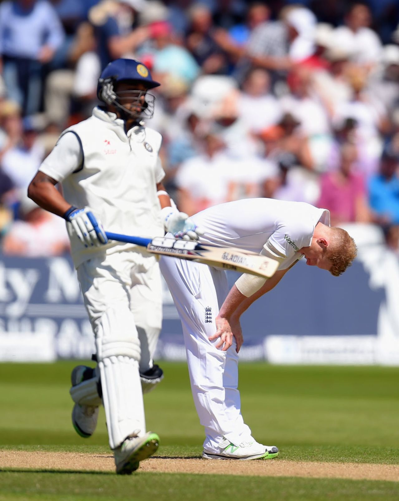 Ben Stokes wears a frustrated look as M Vijay completes a run, England v India, 1st Investec Test, Trent Bridge, 2nd day, July 10, 2014