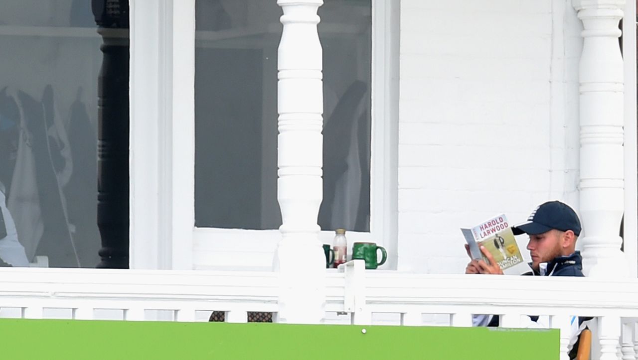 Stuart Broad tucks into a book on Harold Larwood, England v India, 1st Investec Test, Trent Bridge, 3rd day, July 11, 2014