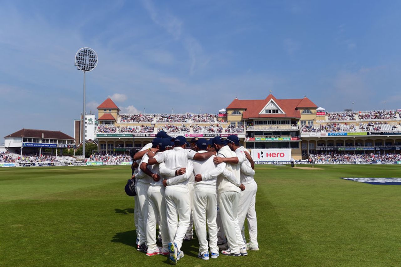 The Indian players embrace into a huddle, England v India, 1st Investec Test, Trent Bridge, 4th day, July 12, 2014