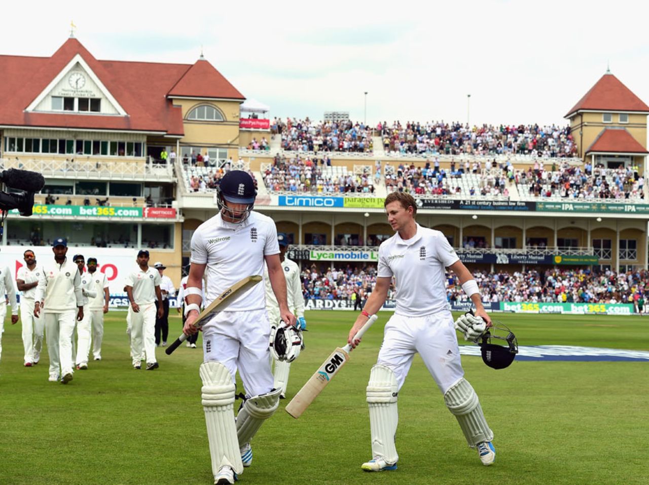 Joe Root and James Anderson leave the field for lunch, England v India, 1st Investec Test, Trent Bridge, 4th day, July 12, 2014