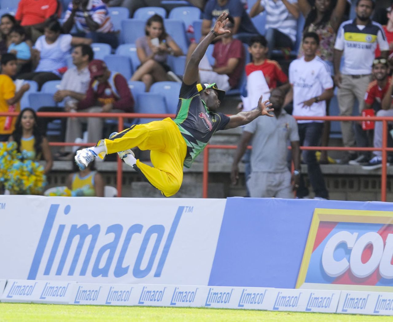 Andre Russell goes flying in the deep, St Lucia Zouks v Jamaica Tallawahs, CPL 2014, Grenada, July 12, 2014