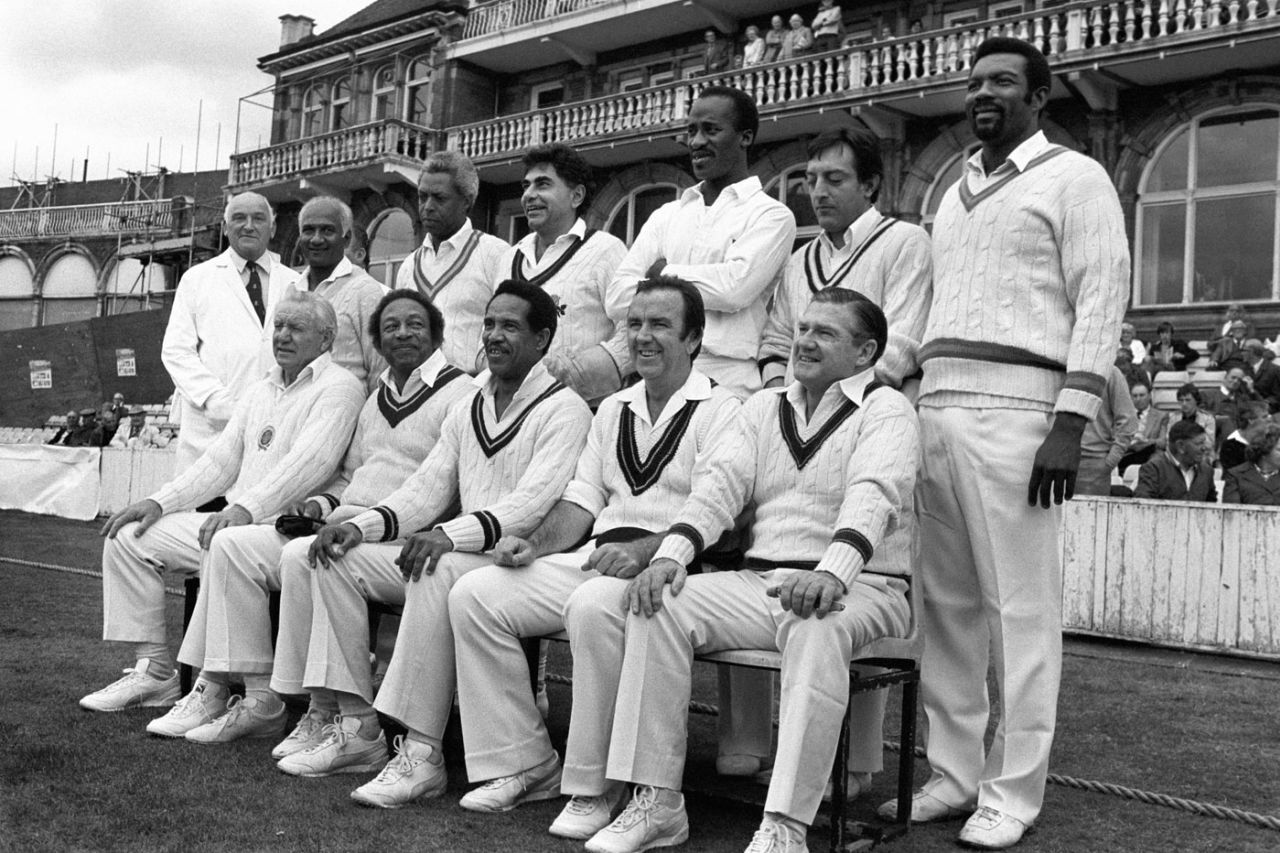 The Old World XI squad poses for photos before the match against the Old England XI at The Oval. Standing (left to right): unknown umpire, Rohan Kanhai, Lance Gibbs, Farokh Engineer, Vanburn Holder, Nawab of Pataudi jr and Charlie Griffith; Sitting: Ray Lindwall, Bertie Clarke, Garry Sobers, Bob Simpson and Neil Harvey, September 17, 1983