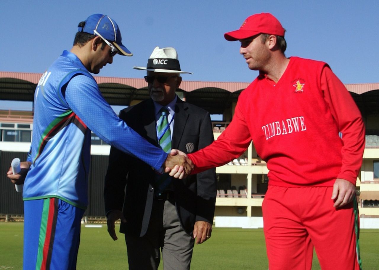 Mohammad Nabi and Brendan Taylor shake hands, Zimbabwe v Afghanistan, 1st ODI, Bulawayo, July 18, 2014
