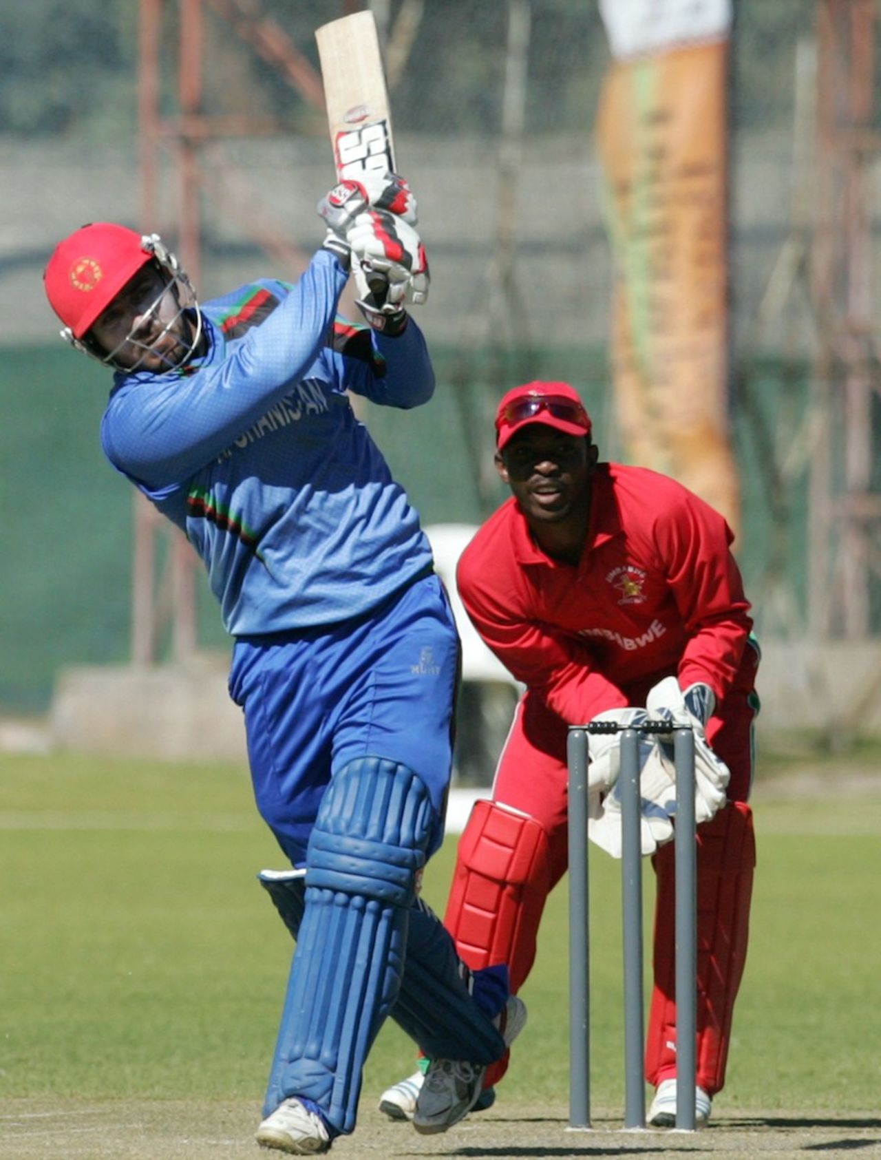 Samiullah Shenwari launches one over midwicket, Zimbabwe v Afghanistan, 1st ODI, Bulawayo, July 18, 2014