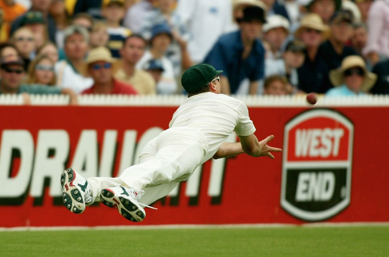Glenn McGrath dives to take a catch to dismiss Michael Vaughan, Australia v England, 2nd Test, Adelaide, 4th day, November 24, 2002