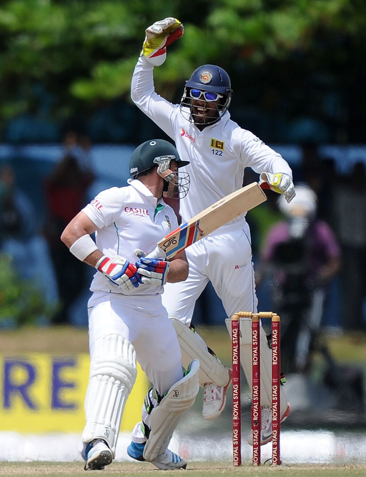 Dinesh Chandimal celebrates after taking a catch off Dean Elgar, Sri Lanka v South Africa, 1st Test, Galle, 4th day, July 19, 2014