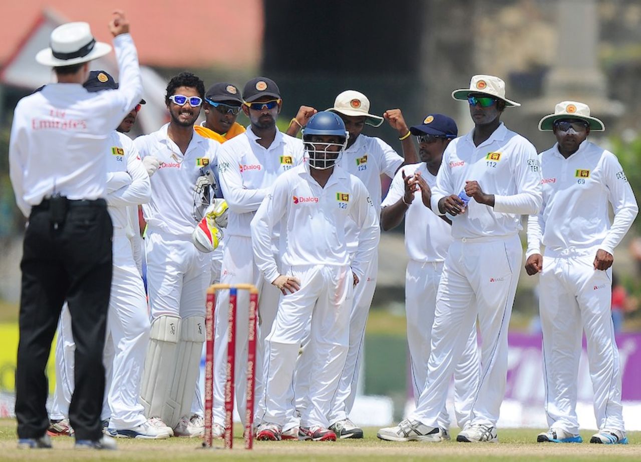Billy Bowden relays the third-umpire's decision after Alviro Petersen asked for a review, Sri Lanka v South Africa, 1st Test, Galle, 4th day, July 19, 2014