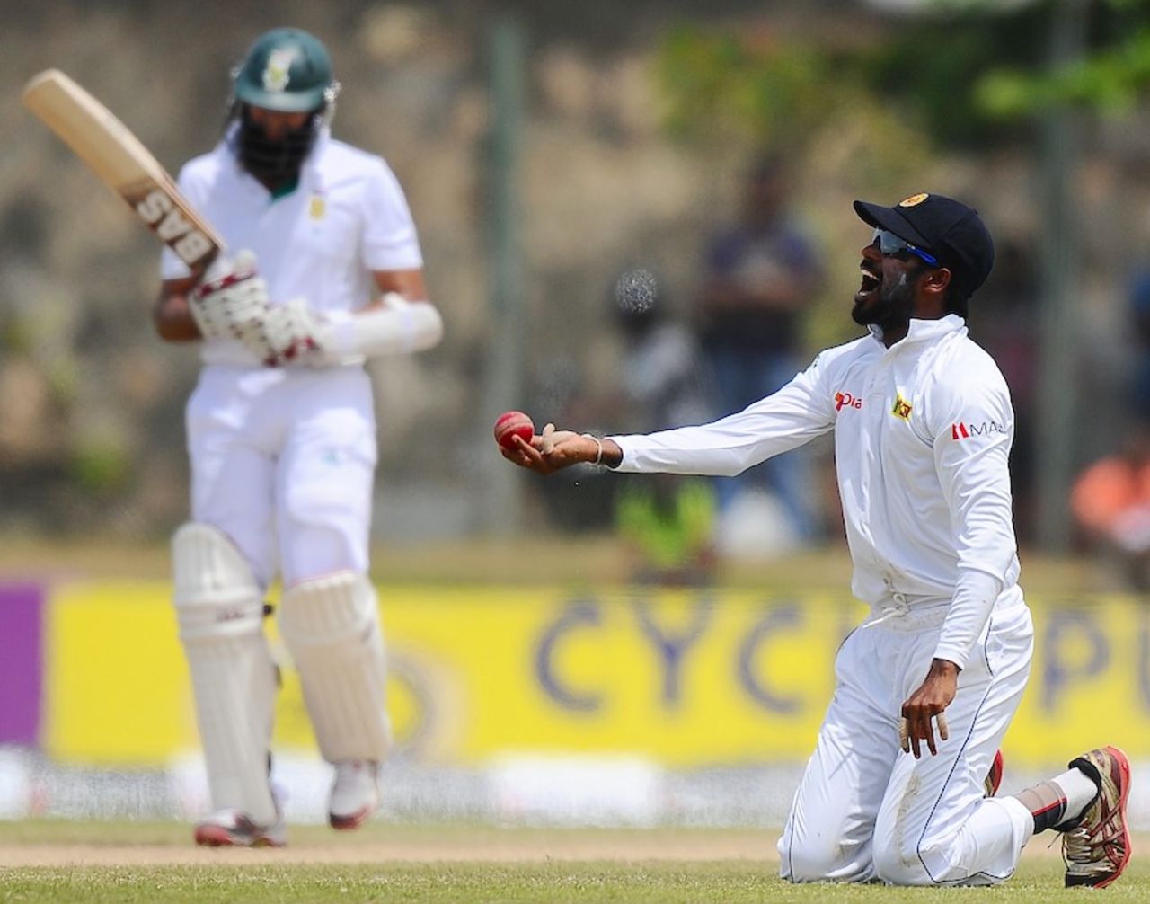 Upul Tharanga celebrates after catching Hashim Amla at midwicket, Sri Lanka v South Africa, 1st Test, Galle, 4th day, July 19, 2014