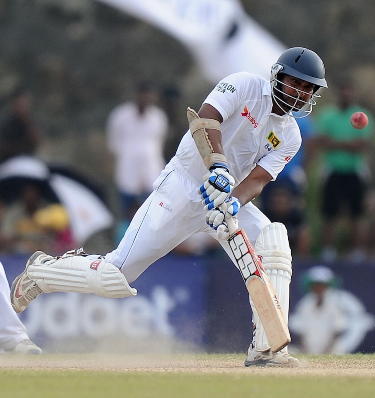 Kumar Sangakkara comes down the pitch to smother the spin, Sri Lanka v South Africa, 1st Test, Galle, 4th day, July 19, 2014