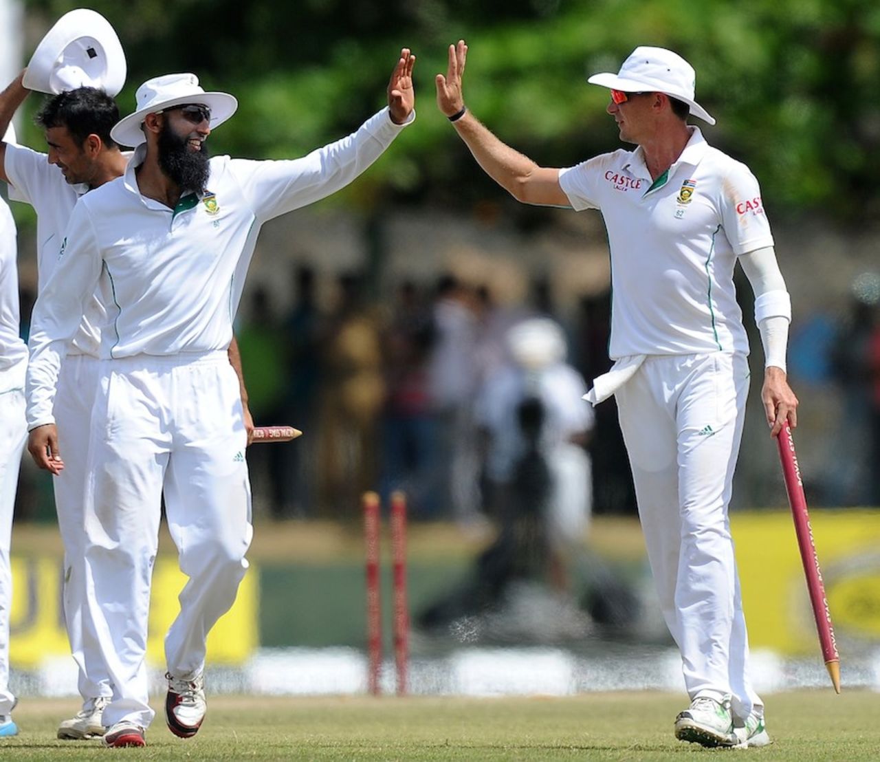 Hashim Amla high-fives with Dale Steyn after the win, Sri Lanka v South Africa, 1st Test, Galle, 5th day, July 20, 2014