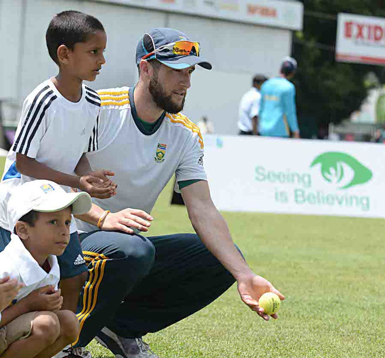 Wayne Parnell spends time with kids at a charity event for the visually impaired, Colombo, July 23, 2014