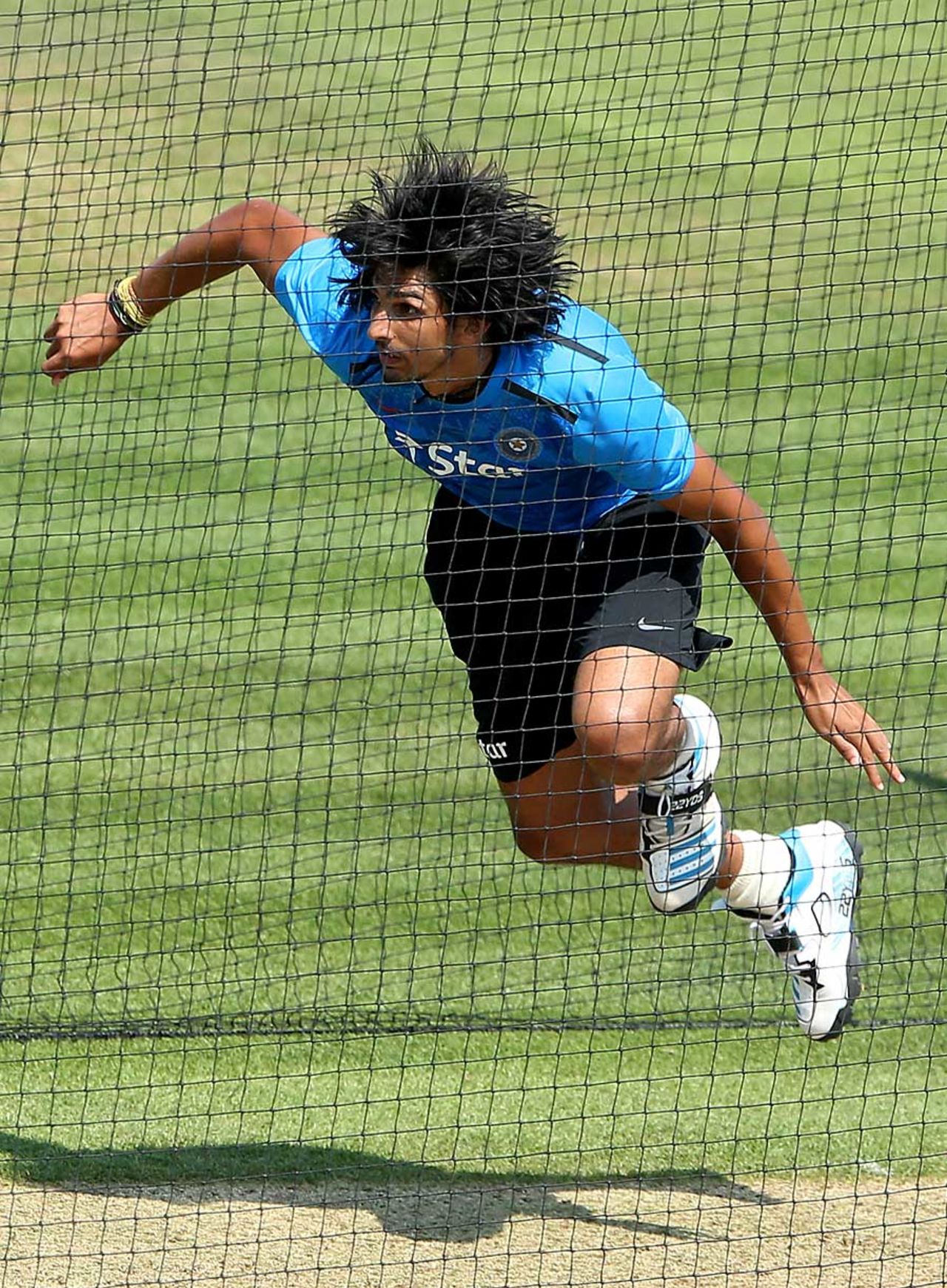 Ishant Sharma steams in during India's net session, Ageas Bowl, July 25, 2014
