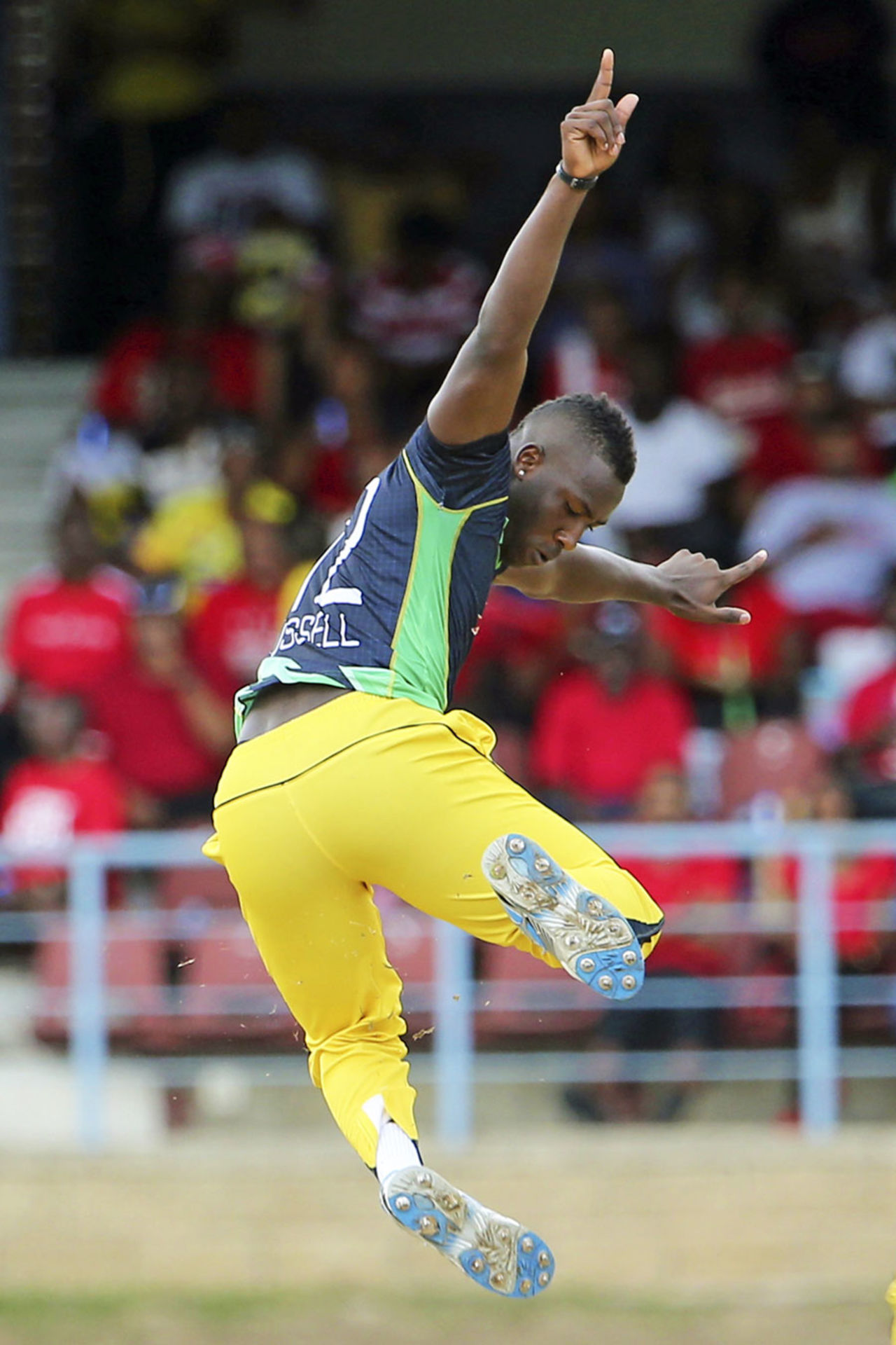 Andre Russell leaps after taking a wicket, Trinidad & Tobago Red Steel v Jamaica Tallawahs, CPL 2014, Port of Spain, July 26, 2014