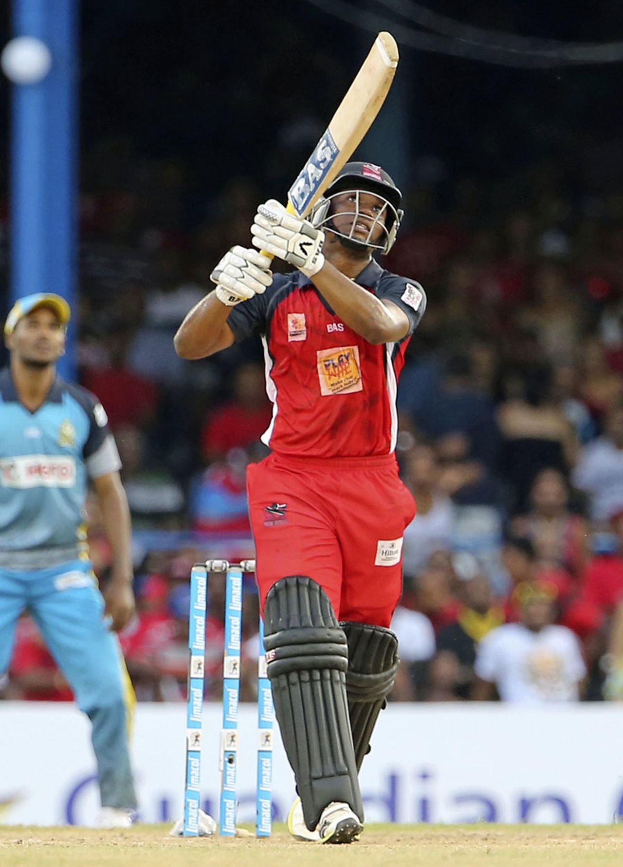 Evin Lewis plays a lofted shot down the ground, Trinidad & Tobago Red Steel v St Lucia Zouks, CPL 2014, Port-of-Spain, July 27, 2014