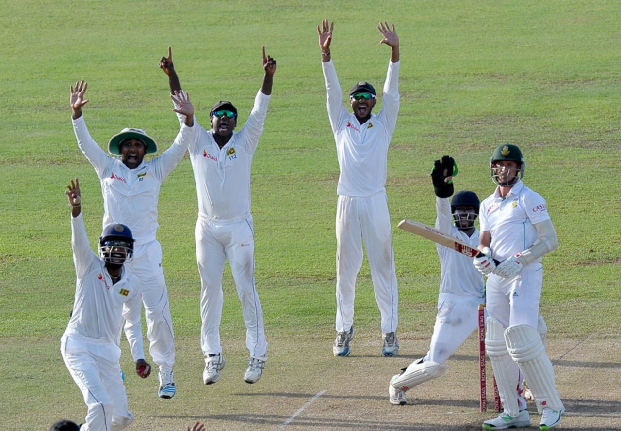 Please, please, please!!: Sri Lanka appeal desperately for Dale Steyn's wicket, Sri Lanka v South Africa, 2nd Test, Colombo, 5th day, July 28, 2014