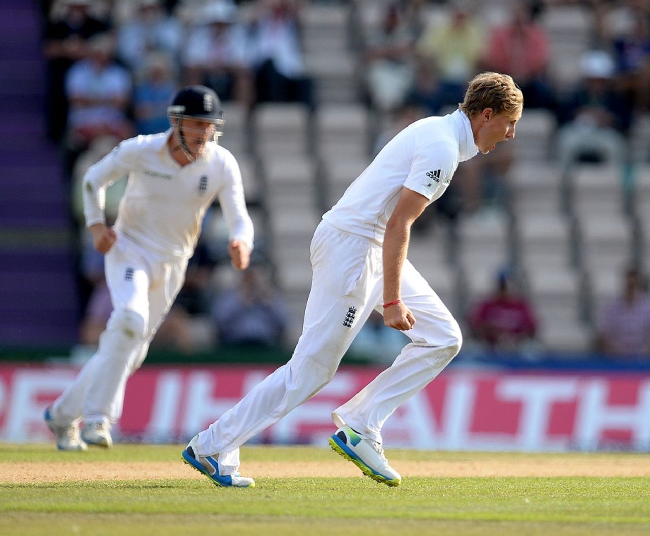 Joe Root sets off on a celebratory run after dismissing Shikhar Dhawan, England v India, 3rd Investec Test, Ageas Bowl, 4th day, July 30, 2014