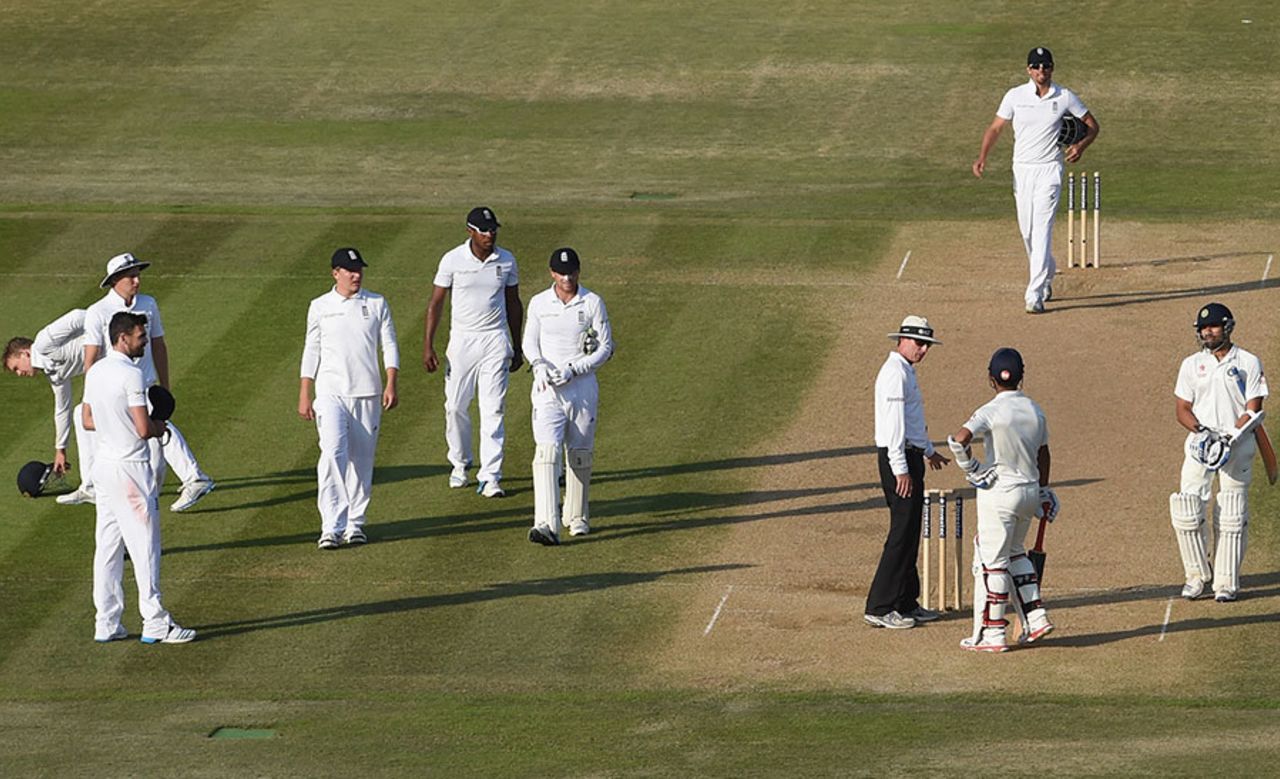 Umpire Rod Tucker talks to the batsmen after an exchange with James Anderson, England v India, 3rd Investec Test, Ageas Bowl, 4th day, July 30, 2014