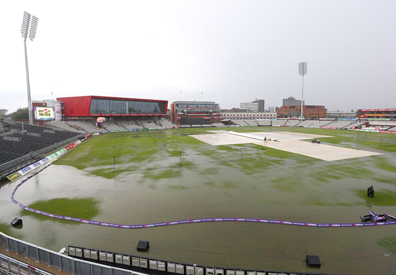 Cricket ground or lake? Heavy rain forced the first T20 Blast quarter-final into a reserve day, Lancashire v Glamorgan, NatWest T20 Blast, Old Trafford, August 1, 2014
