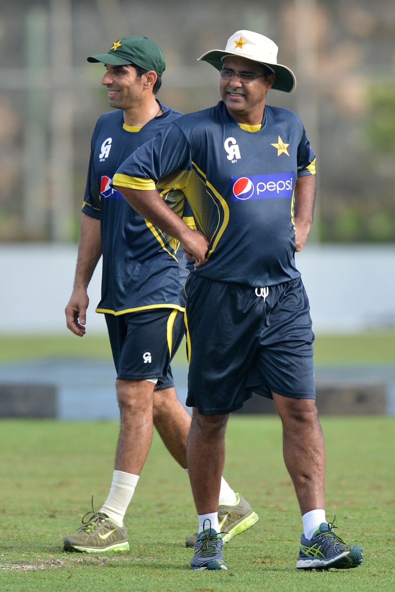 Misbah-ul-Haq and Waqar Younis are all smiles during a practice session, Galle, August 3, 2014