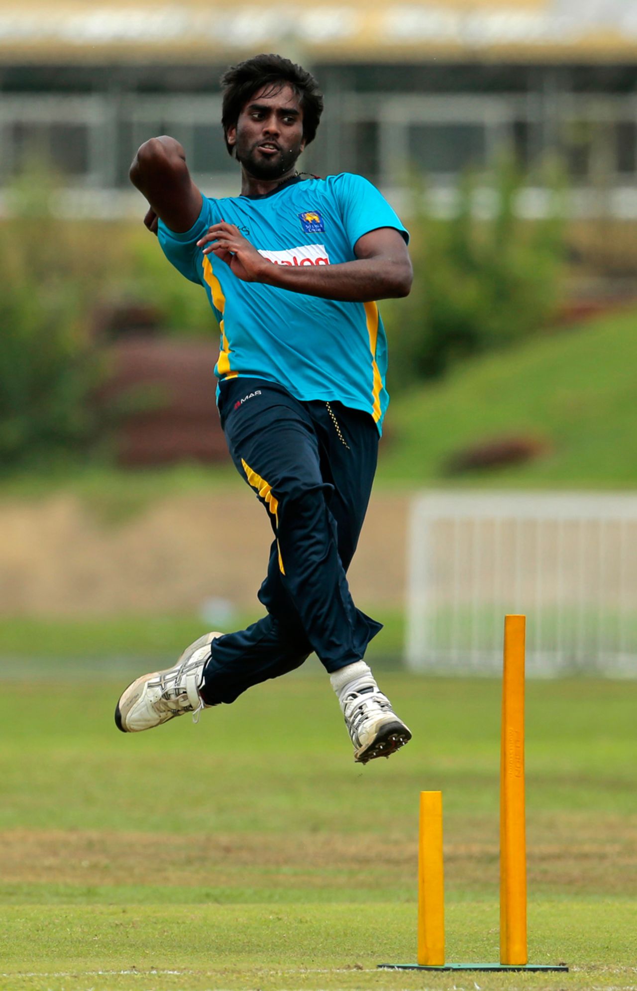Nuwan Pradeep has a bowl at training, Galle, August 5, 2014