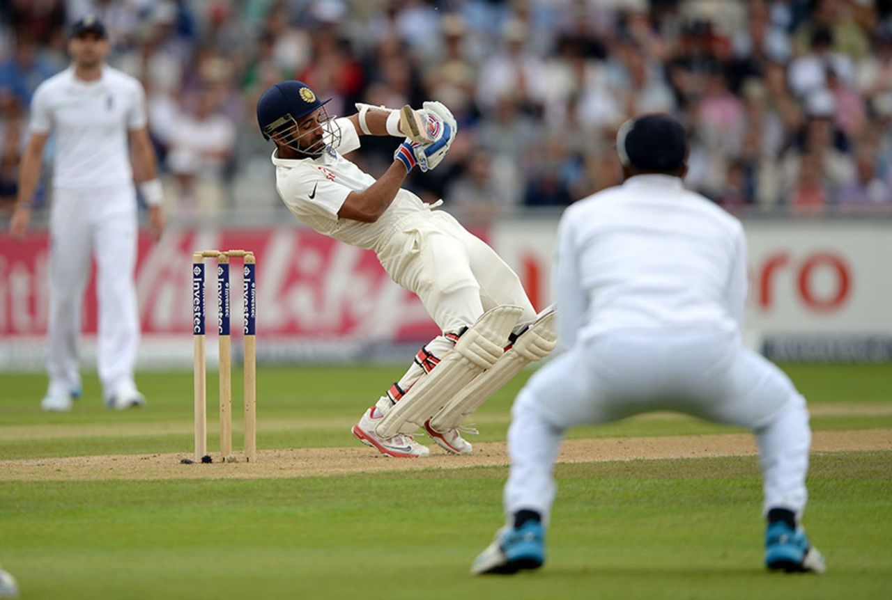 Ajinkya Rahane sways away from a Stuart Broad lifter, England v India, 4th Test, Old Trafford, 1st day, August 7, 2014