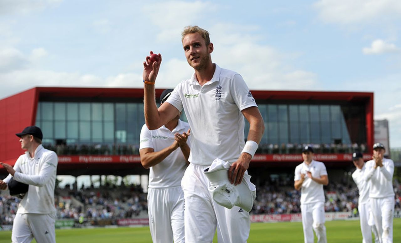 Stuart Broad leads his teammates off the field after finishing with six wickets, England v India, 4th Test, Old Trafford, 1st day, August 7, 2014