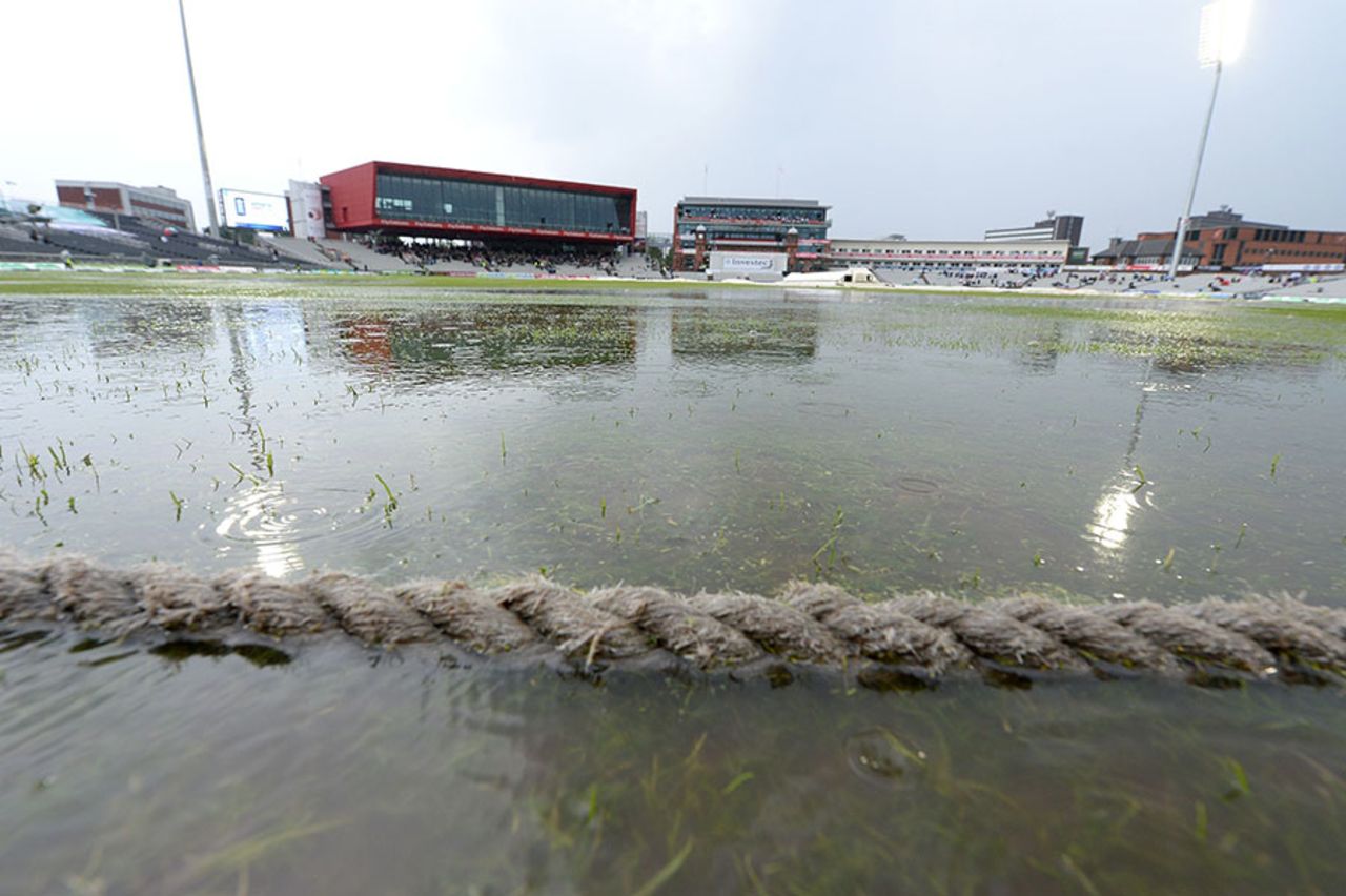 The rain came down hard at Old Trafford, England v India, 4th Test, Old Trafford, 2nd day, August 8, 2014