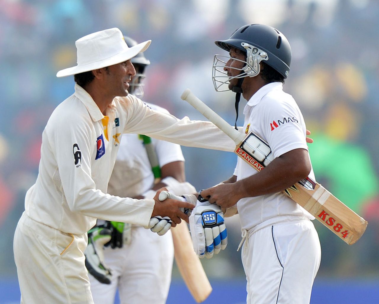 Younis Khan congratulates Kumar Sangakkara on his double-century, Sri Lanka v Pakistan, 1st Test, Galle, 4th day, August 9, 2014