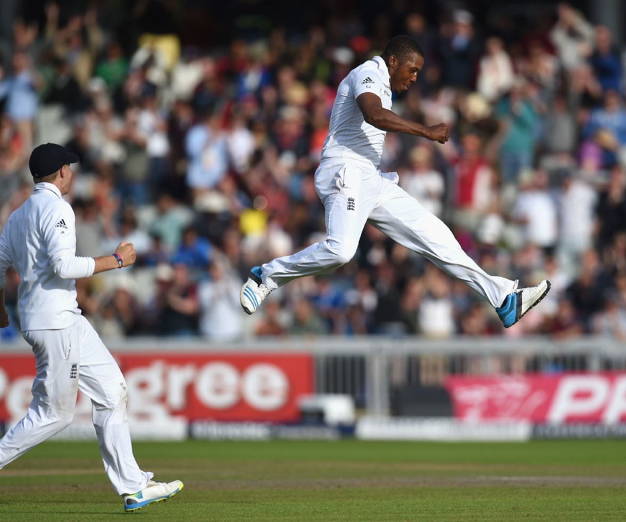 Chris Jordan leaps in the air after taking the final wicket, England v India, 4th Test, Old Trafford, 3rd day, August 9, 2014