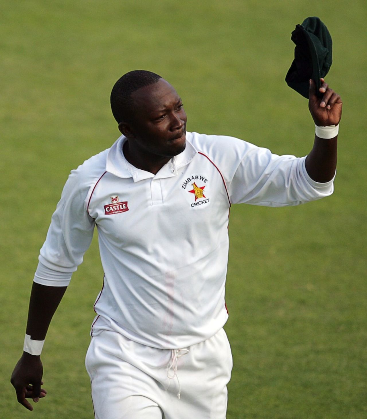 John Nyumbu acknowledges cheers from the crowd, Zimbabwe v South Africa, only Test, Harare, 3rd day, August 11, 2014

