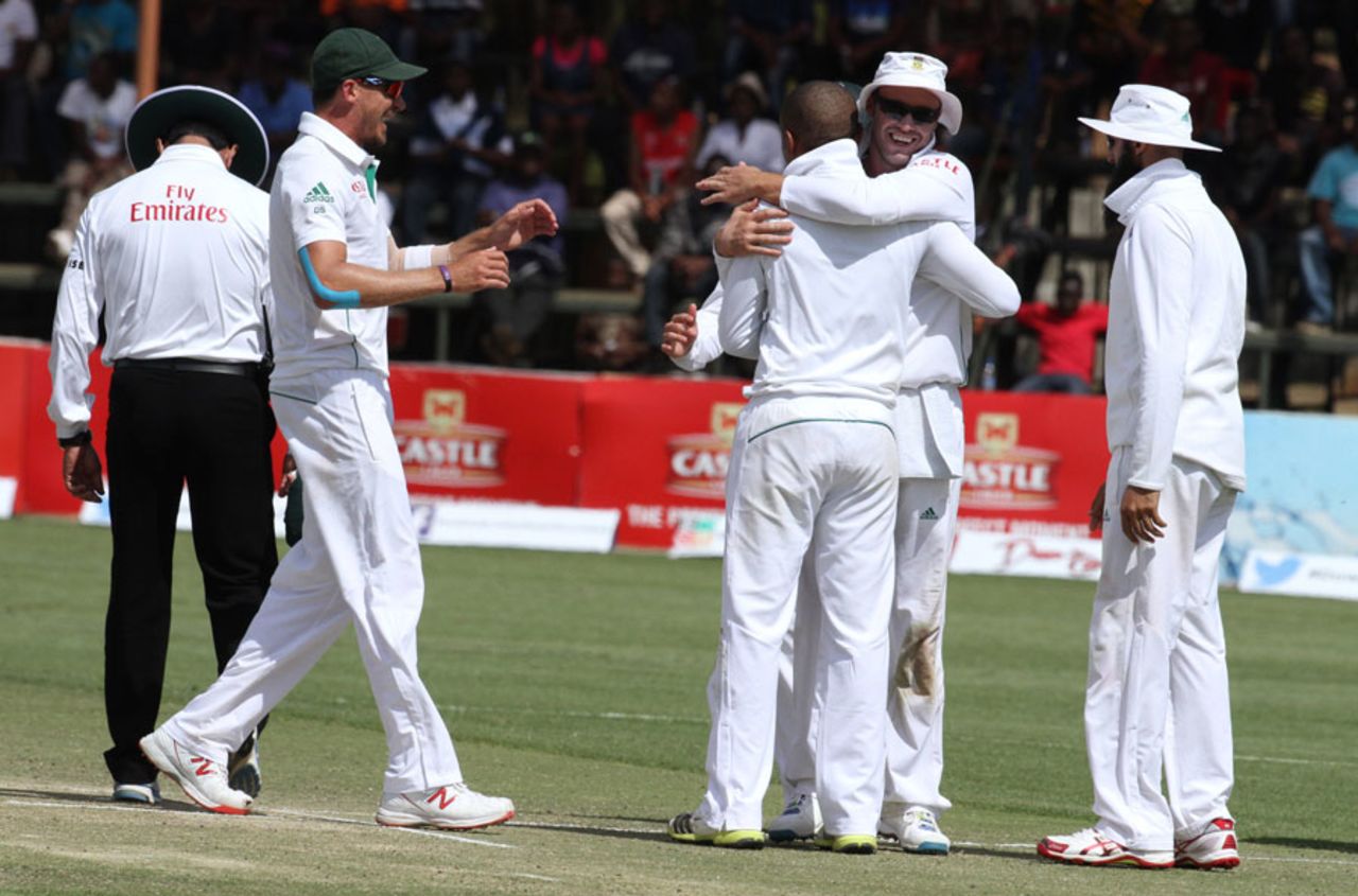 The South Africa players celebrate the wicket of Brendan Taylor, Zimbabwe v South Africa, only Test, Harare, 4th day, August 12, 2014