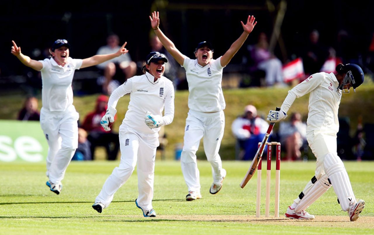 The England players celebrate the wicket of Smriti Mandhana, England Women v India Women, Only Test, Wormsley, 1st day, August 13, 2014