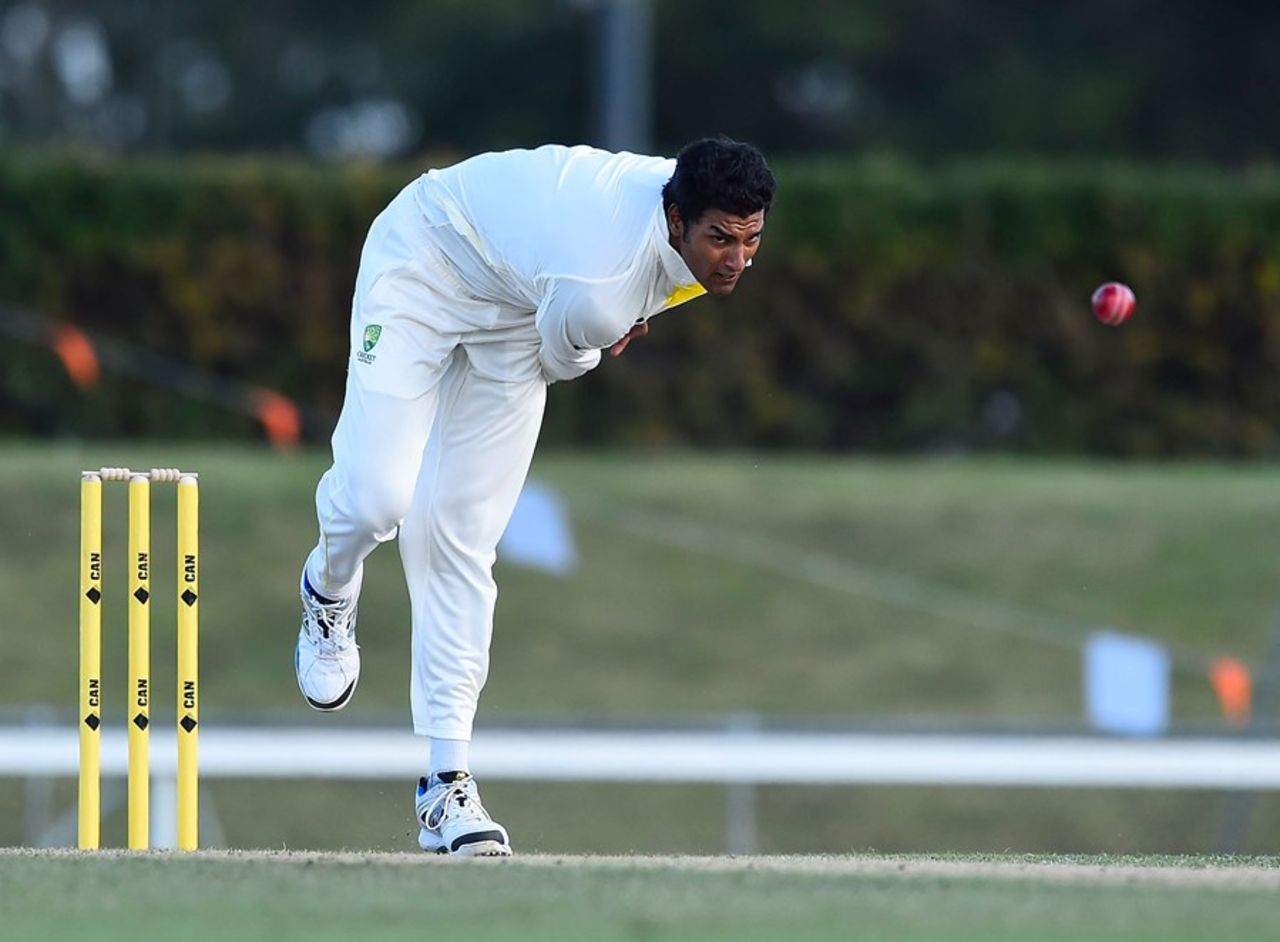 Gurinder Sandhu sends down a delivery, Australia A v South Africa A, 1st unofficial Test, Townsville, August 7, 2014