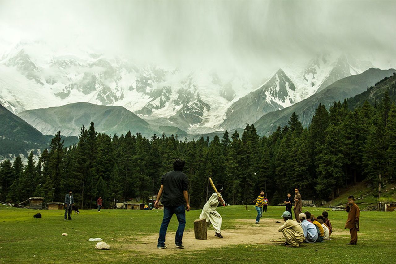 <b>Syed Hasnain:</b> Locals enjoy a spot of summer afternoon cricket at Fairy Meadows in Pakistan, with the mighty mountain Nanga Parbat as the backdrop, and a pine-tree forest as the sightscreen
